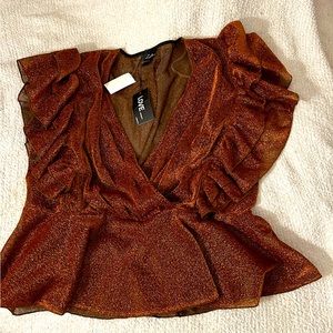 Orange you the Baddest Peplum Top!! 🧡💁🏾‍♀️